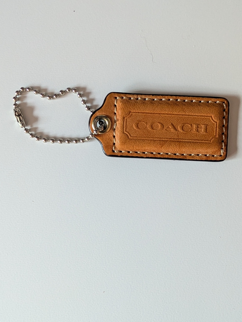 Coach vintage 2.25" British Tan Embossed Leather Hangtag